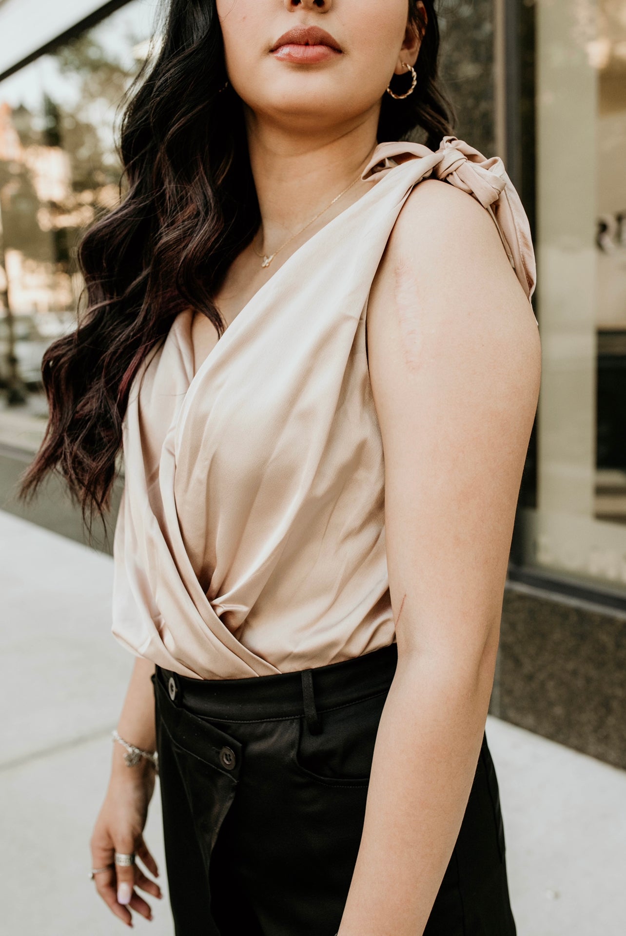 Lindsay Champagne Satin V-Neck Sleeveless Bodysuit side view