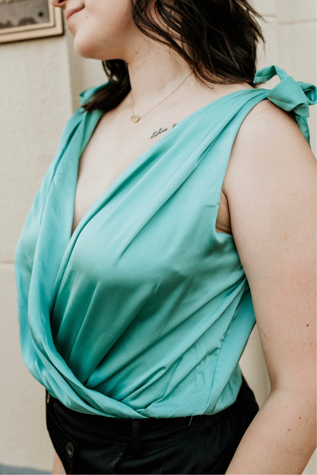 Lindsay Turquoise Satin V-Neck Sleeveless Bodysuit close up look