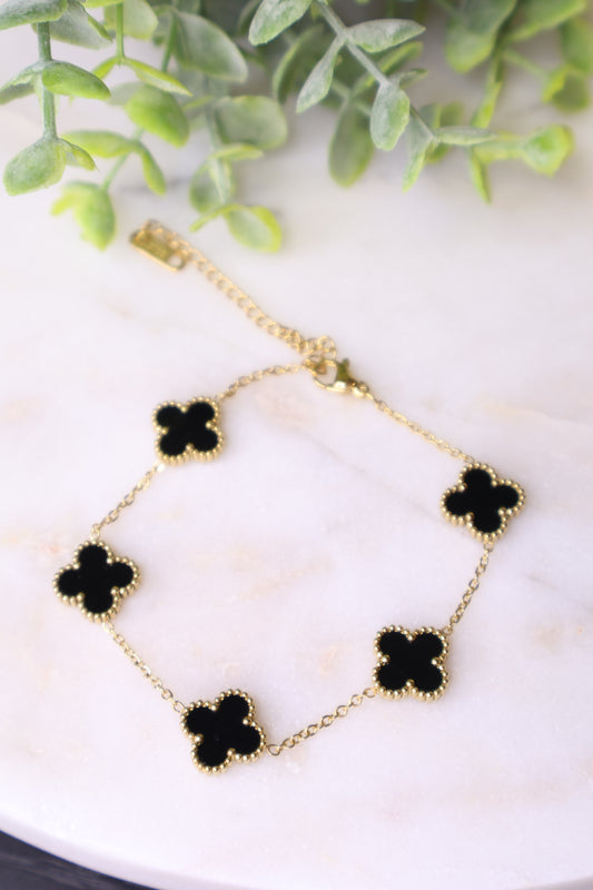 Lucky Luxe: Black & Gold Clover Bracelet