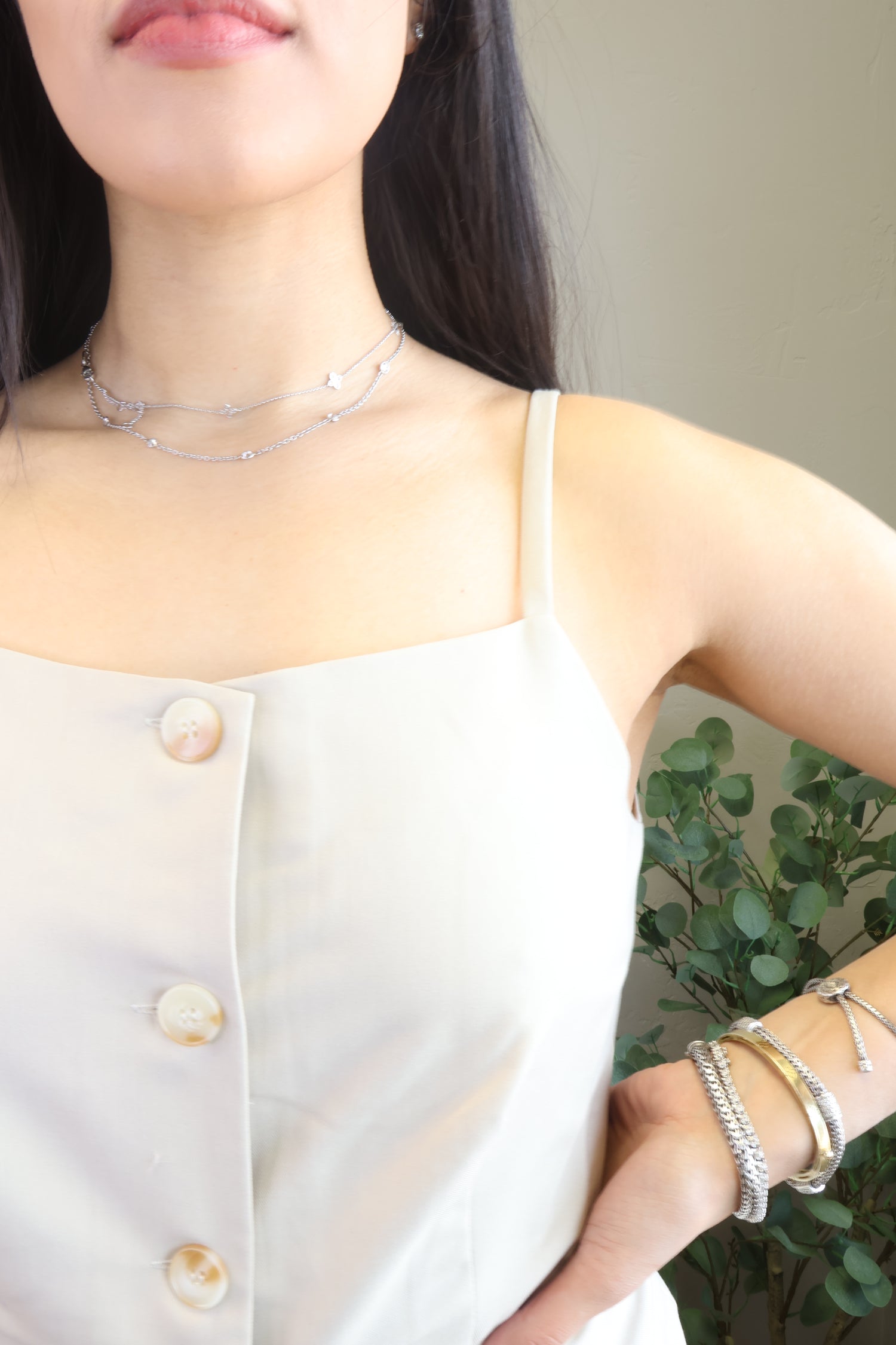 BEIGE ASYMMETRICAL BUTTON-UP VEST TOP CLOSE UP